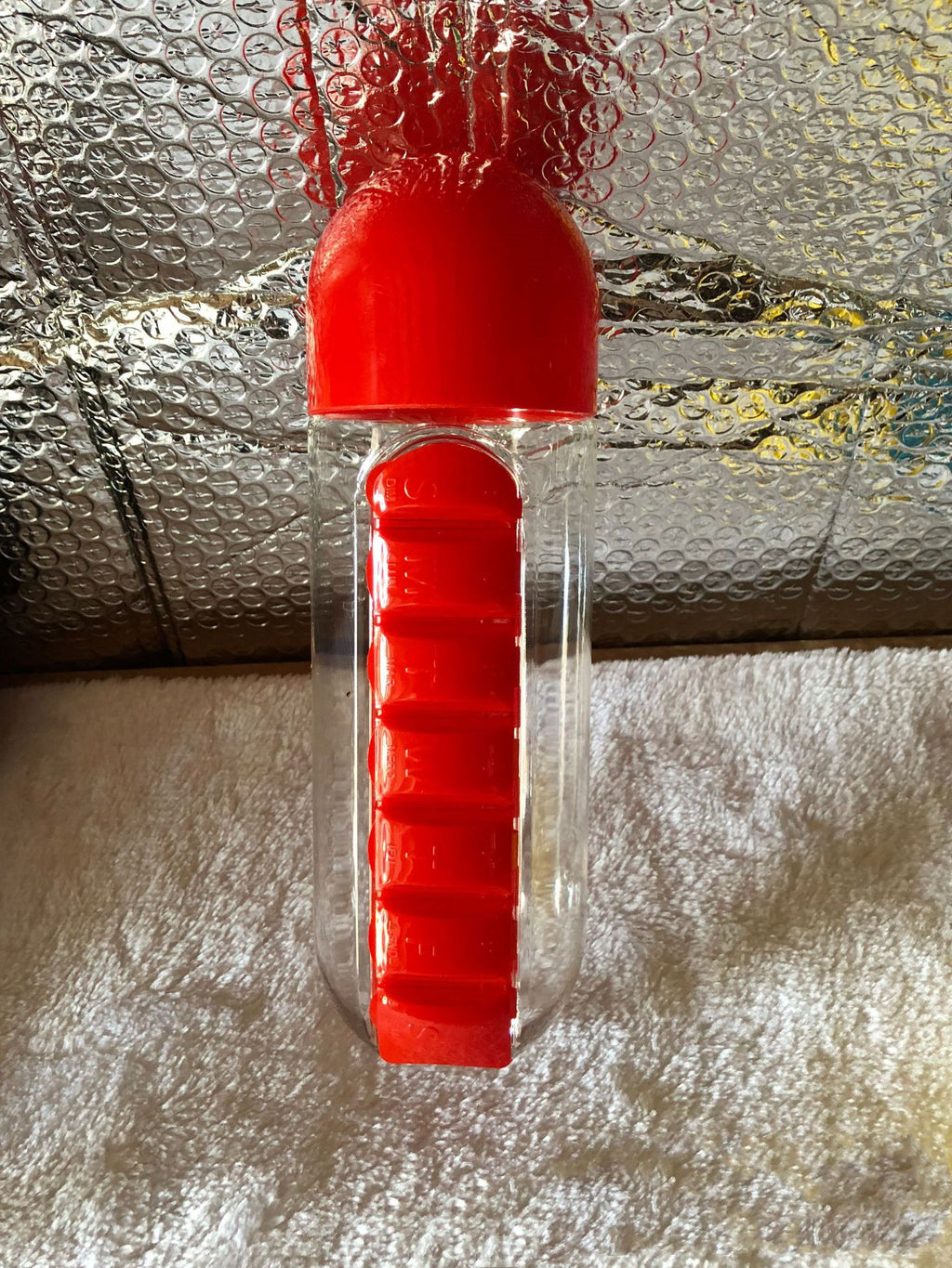 borraccia con porta pillole